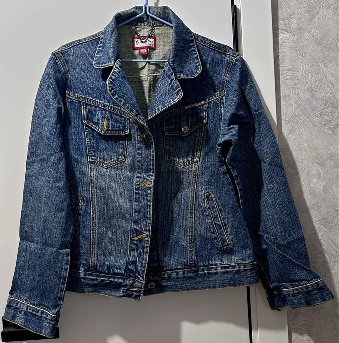 Куртки на девушку