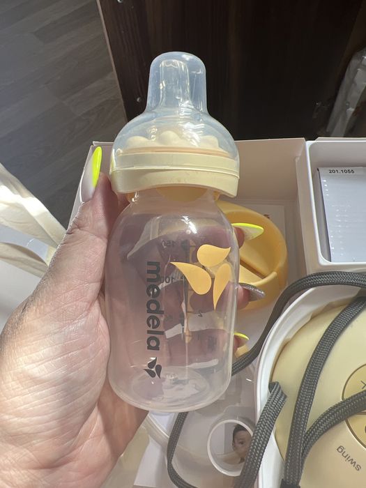 Електрическата помпа за кърма Swing Medela