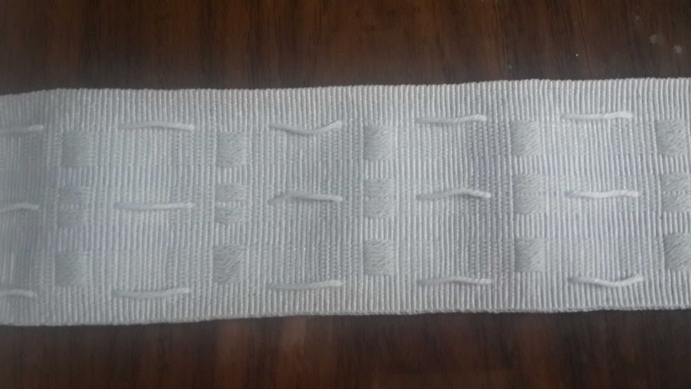 Тесьма для штор. Портьерная лента.