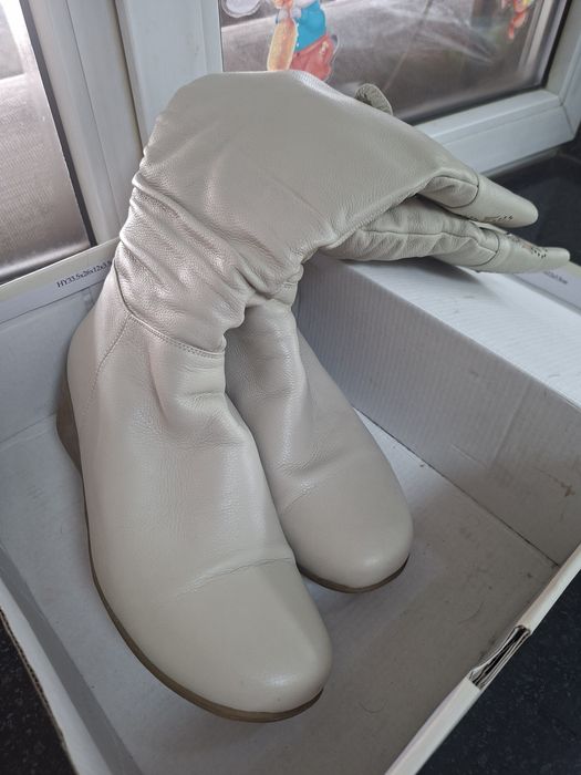 Продам новые зимние сапоги