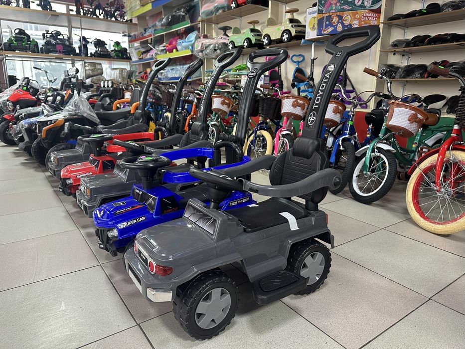 Толокар с родителской ручкой