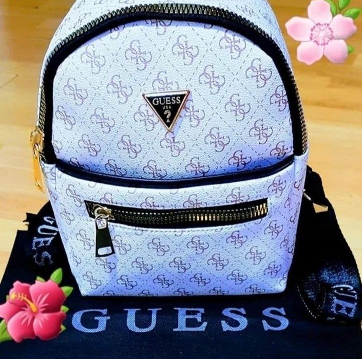 Rucsac Guess dimensiune medie, logo metalic,saculet, etichetă