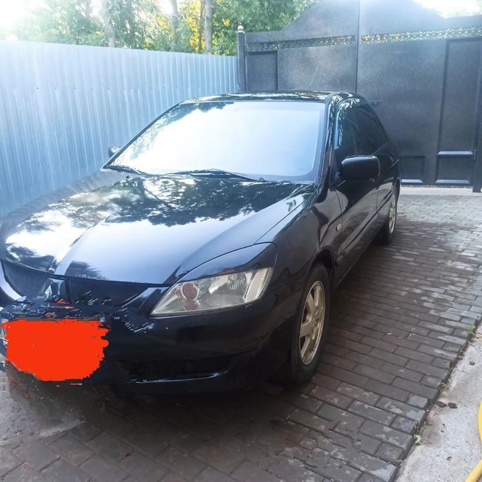 Продам митцубиси лансер