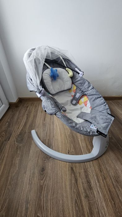Balansoar electric pentru bebeluși Little Bird – cu copertină și jucării