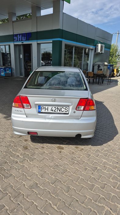 Honda civic 4dr hybrid  schimb