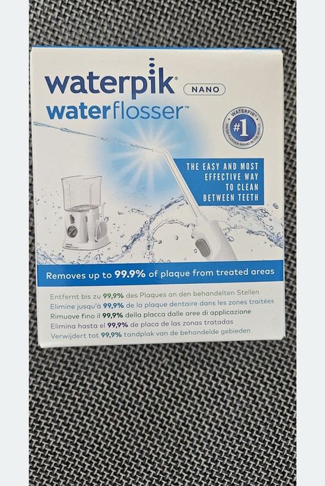 Irigator/Dus bucal Waterpik Nano WP-250, prosusul este nou, sigilat