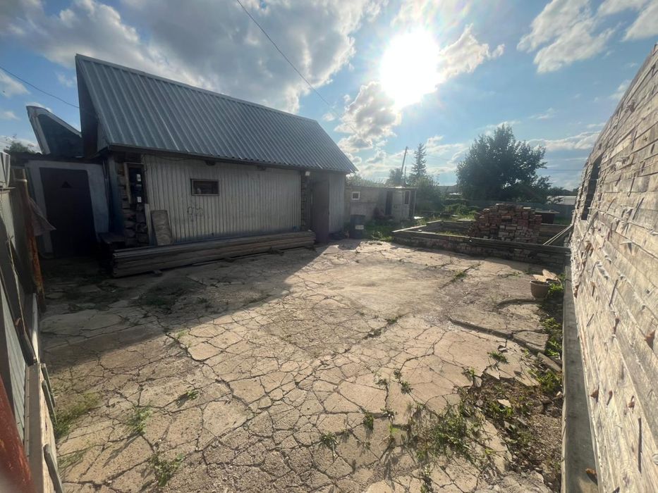 Продам участок не достроеным домом