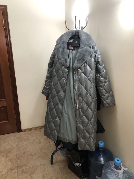 Продам новый Пуховик