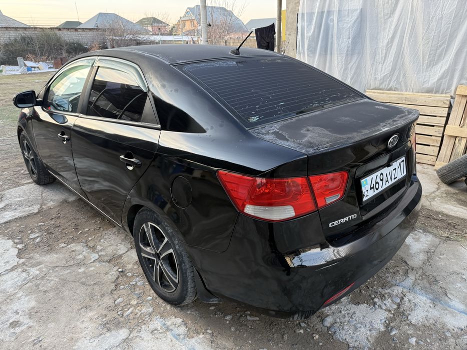 Kia cerato 2011 года