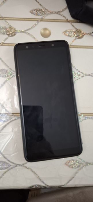 Телефон Самсунг А7