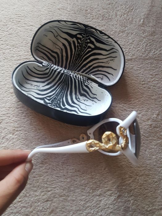 Roberto Cavalli  Dolce gabanna  Gucci