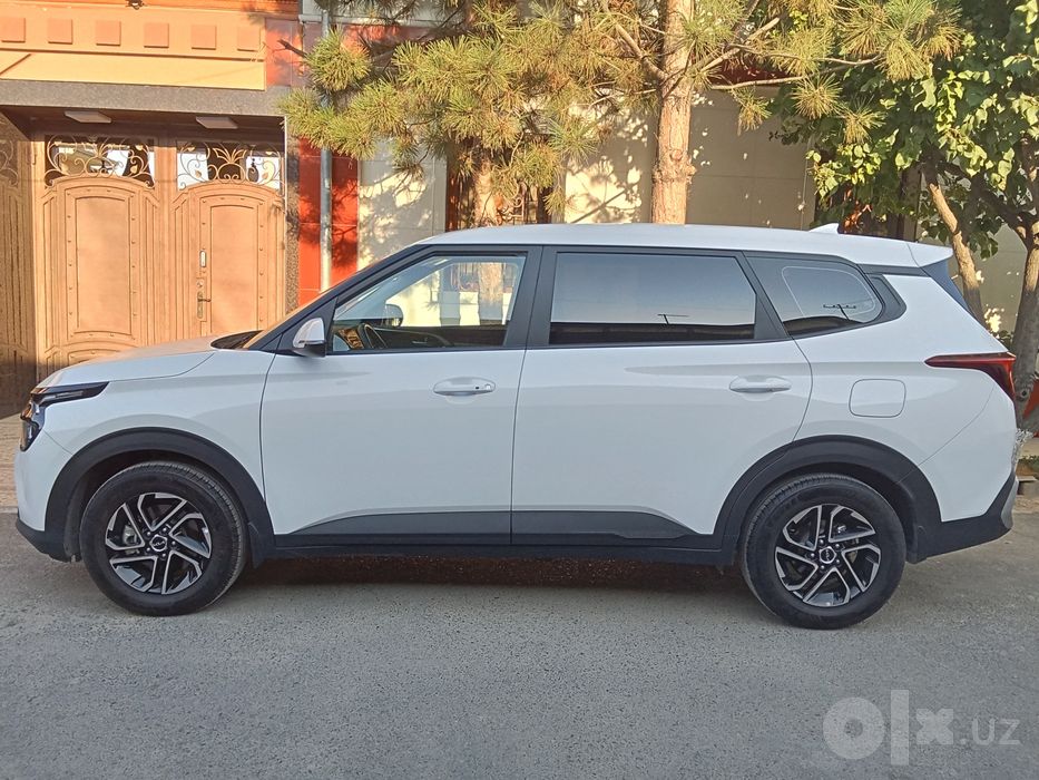 Kia Carens 2- pozitsiya