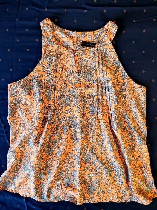 Интересно и елегантно потниче,гръдната му е точно 106 см, няма еластич