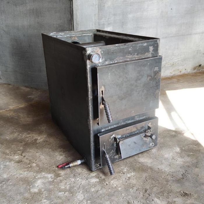 Котёл твердотопливный,  мощность: 15 кВт (до 150 м²)
или