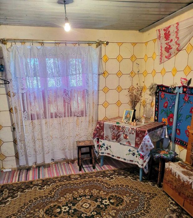 Casă caramida Radoiesti cu teren de 1.138 mp și deschidere la două străzi – 50.000 lei negociabil