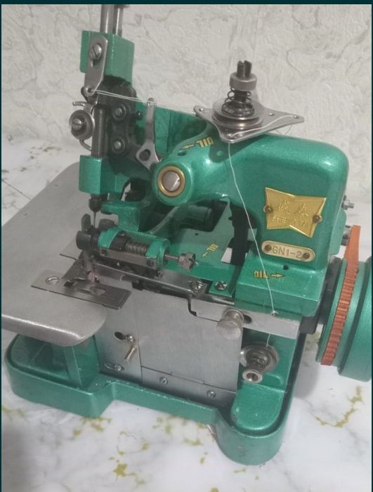 Оверлок цена 35000т