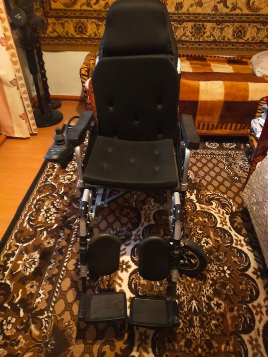 Электронная инвалидная коляска