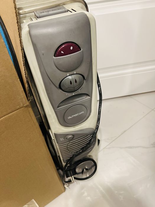 Масляный радиатор (батарея 9 секций)