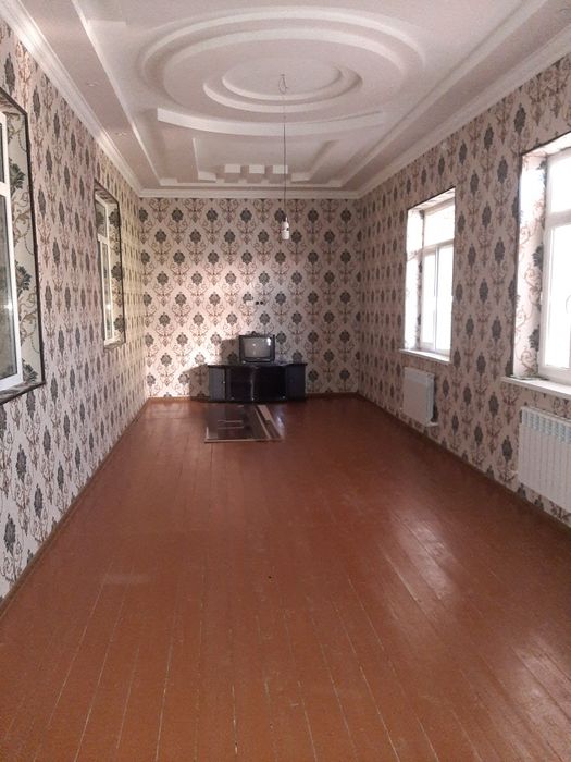 Урганч шахрида 450м² ховли жой сотилади. Евро ремонт килинган.