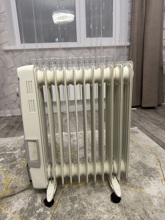 Обогреватель для дома масляный радиатор.