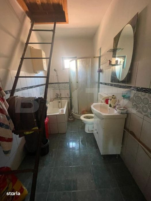 Casa cu 3 camere si un teren in suprafata de 6000 mp