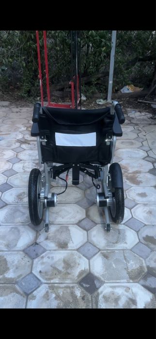Электрическая инвалидная коляска