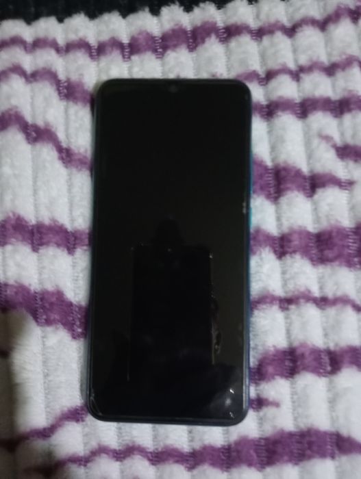 Продам сотовый б. У. Redmi A