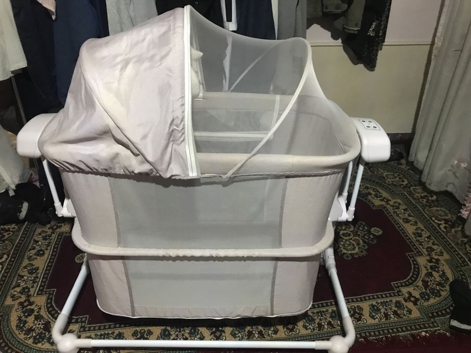 Iyulka, elektronning beshik,bolalar manej krovat.