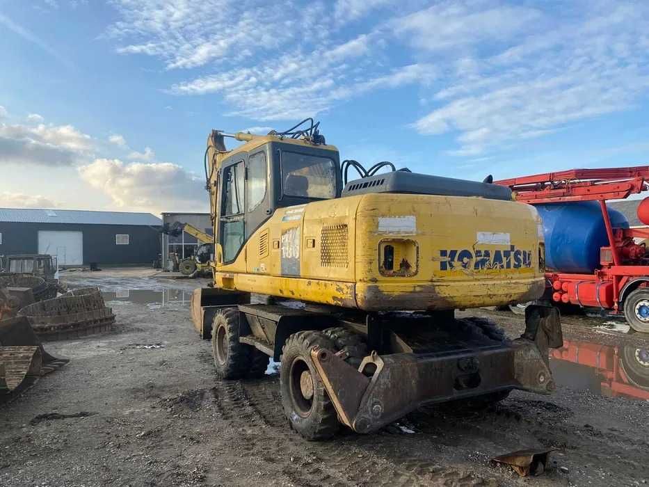 Dezmembrez excavator pe roti Komatsu PW 180 - 7K - piese de schimb