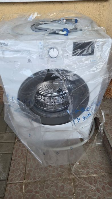 Mașină de spălat Beko WRE7512XAW – 7 kg, A+++, SteamCure