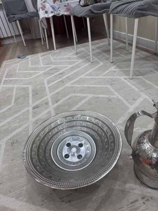 Құман, тазигімен