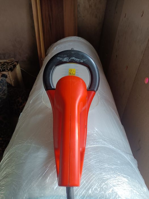 Тример за жива плет