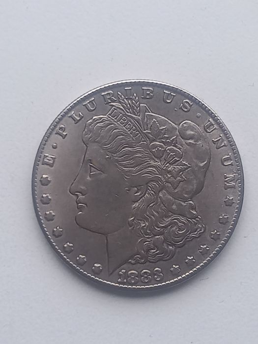 Монета One Dollar