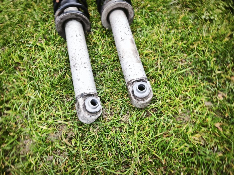 Set 2 amortizoare/telescoape spate BMW E60+arcuri+flanse