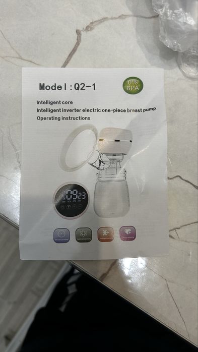 Молокоотсос (электрическая)