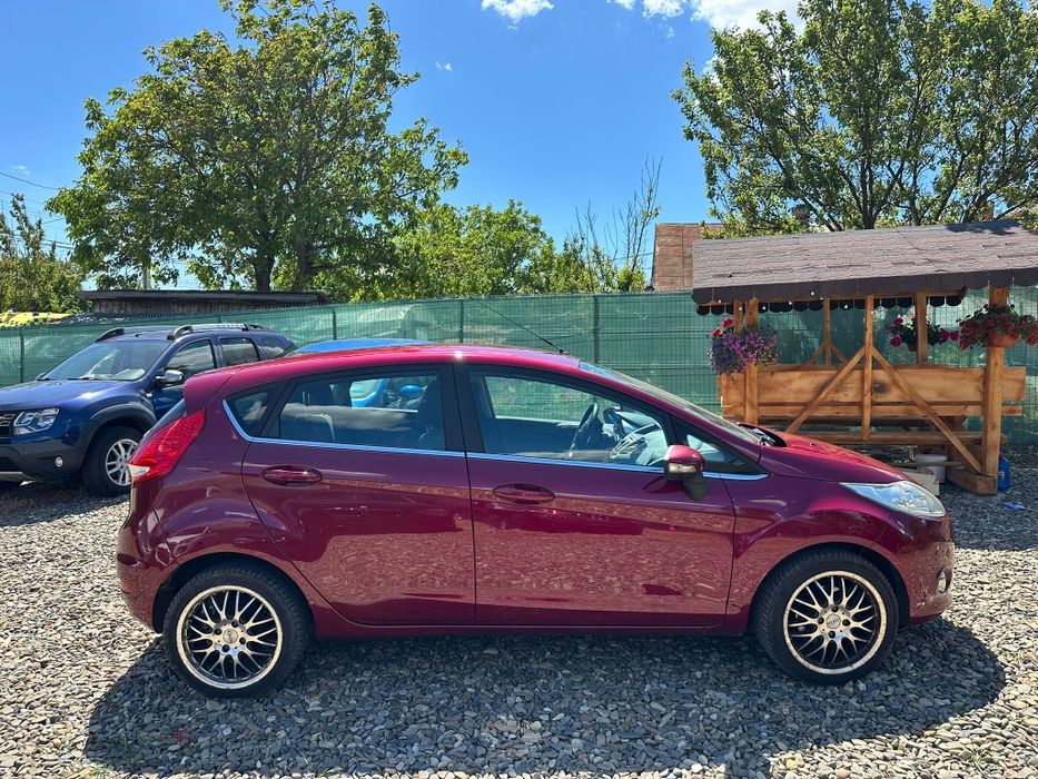 Ford Fiesta Titanium an 2009 pe Acte/ 1.6tdi-90cp/Navi/Climă/Adus Recent!