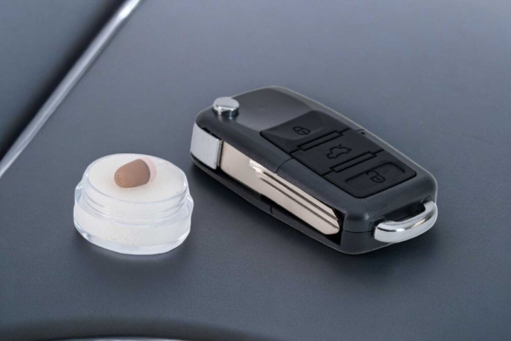 Sistem casti de copiat GSM tip Cheie Auto + casca de copiat fara fir