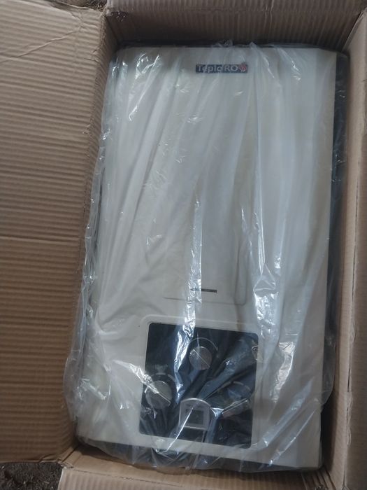 Газовая колонка .