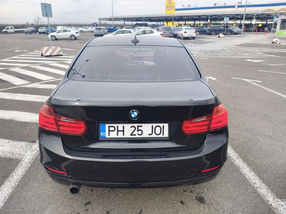 BMW 320i an 2012 184hp