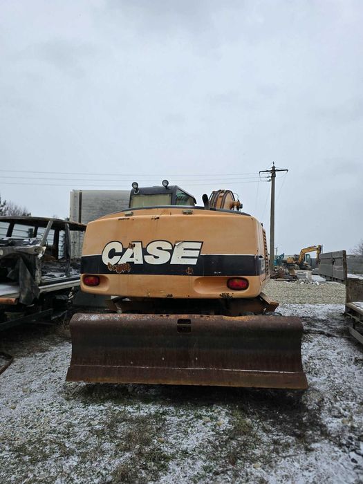 vand  sau dezmembrez excavator pe roti case wx165