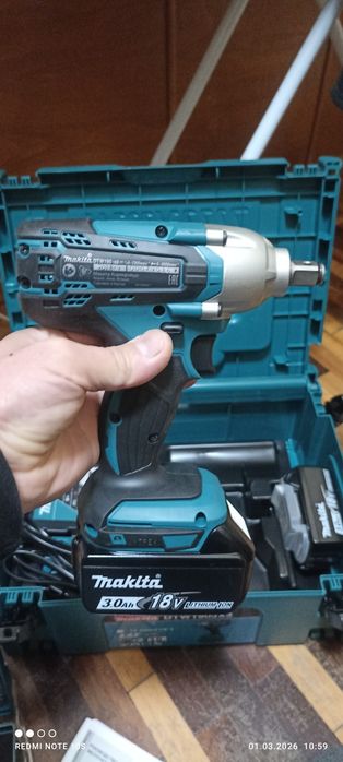 Ударный гайковёрт Makita,с набором ударных головок.