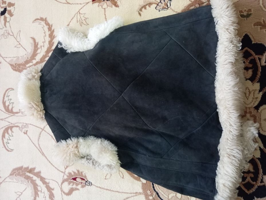 Тёплая безрукавка