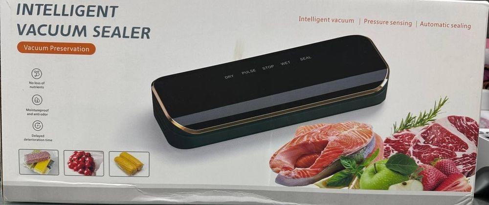 Вакуумный упаковщик.