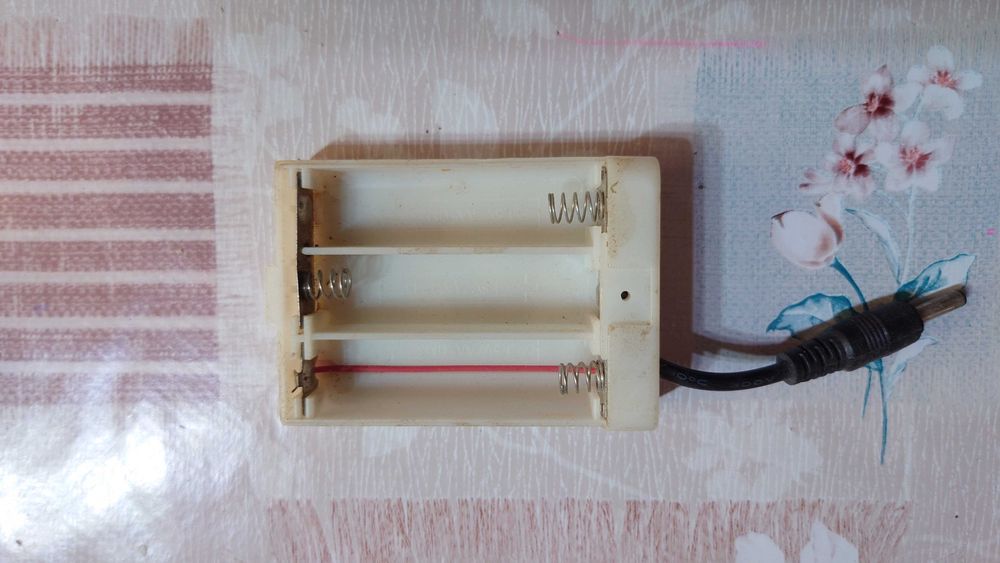 Колодка для питания или зарядки аккумуляторов