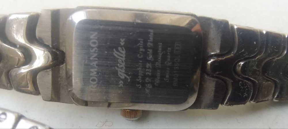 Женские часы  Romanson