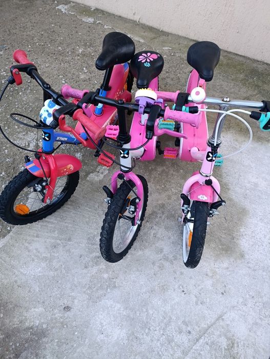 Vând bicicletă copii cu roți pe 14.