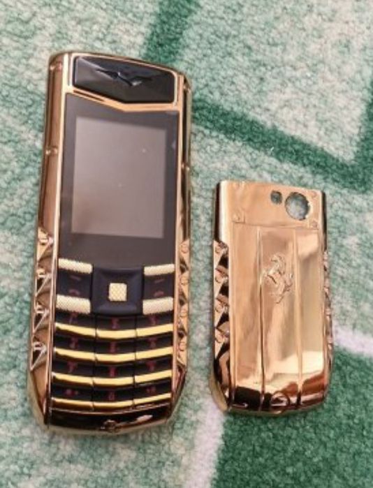 Мобилен телефон марка SERVO с две СИМ карти + кутия + зарядно - работи