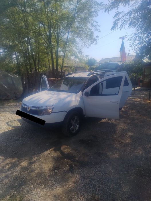 Vand Dacia Duster 2013 sau schimb