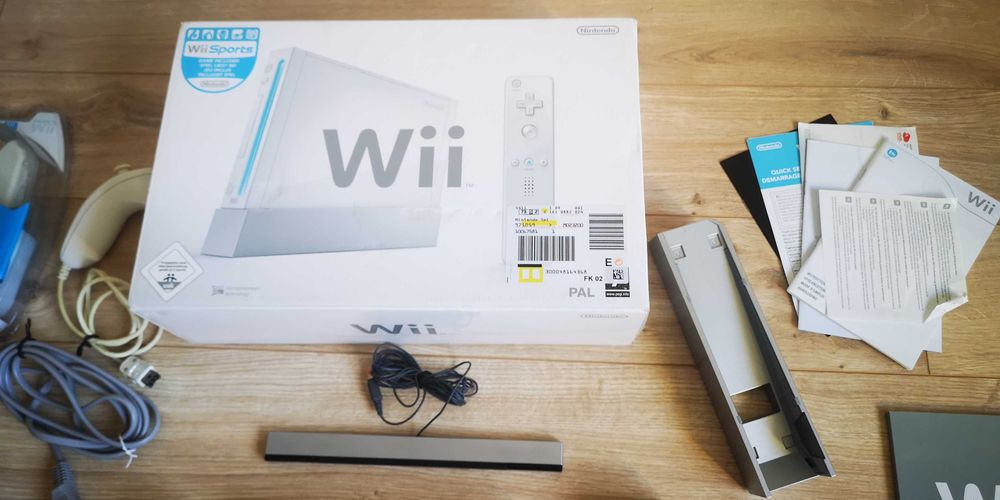Nintendo Wii пълен комплект с кутия два контролера и игра