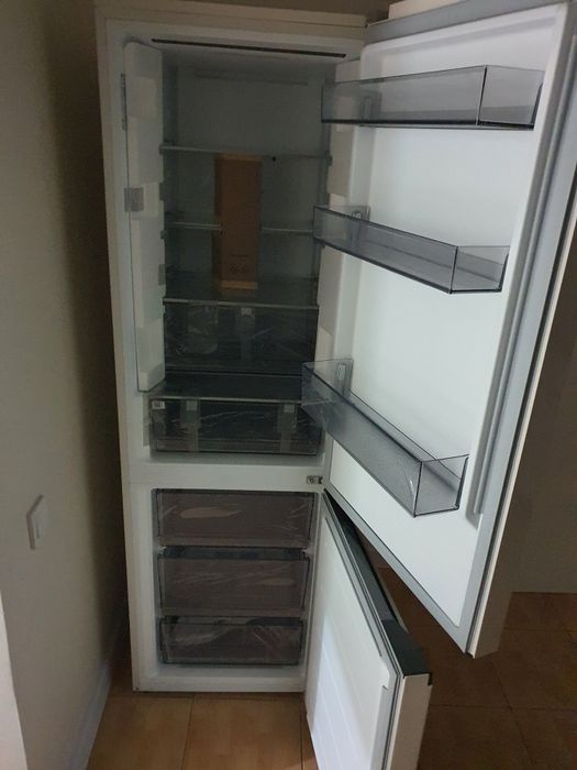 Новый холодильник.